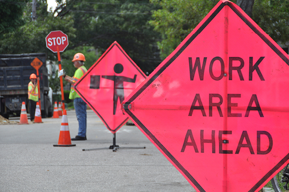 Road work area with flagger holding stop sign